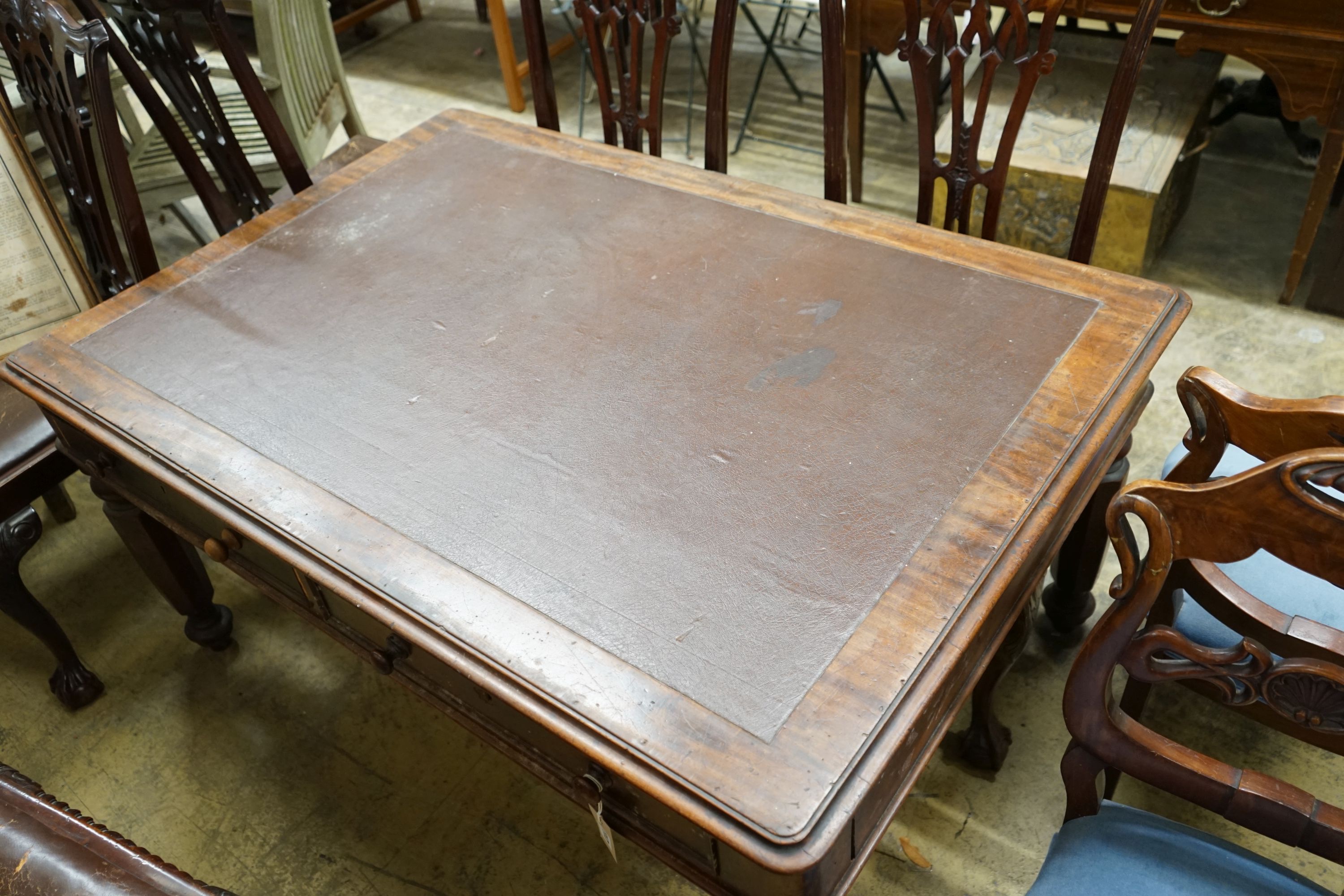 An early 19th century mahogany partner's writing table, cut down, length 136cm, width 92cm, height 66cm